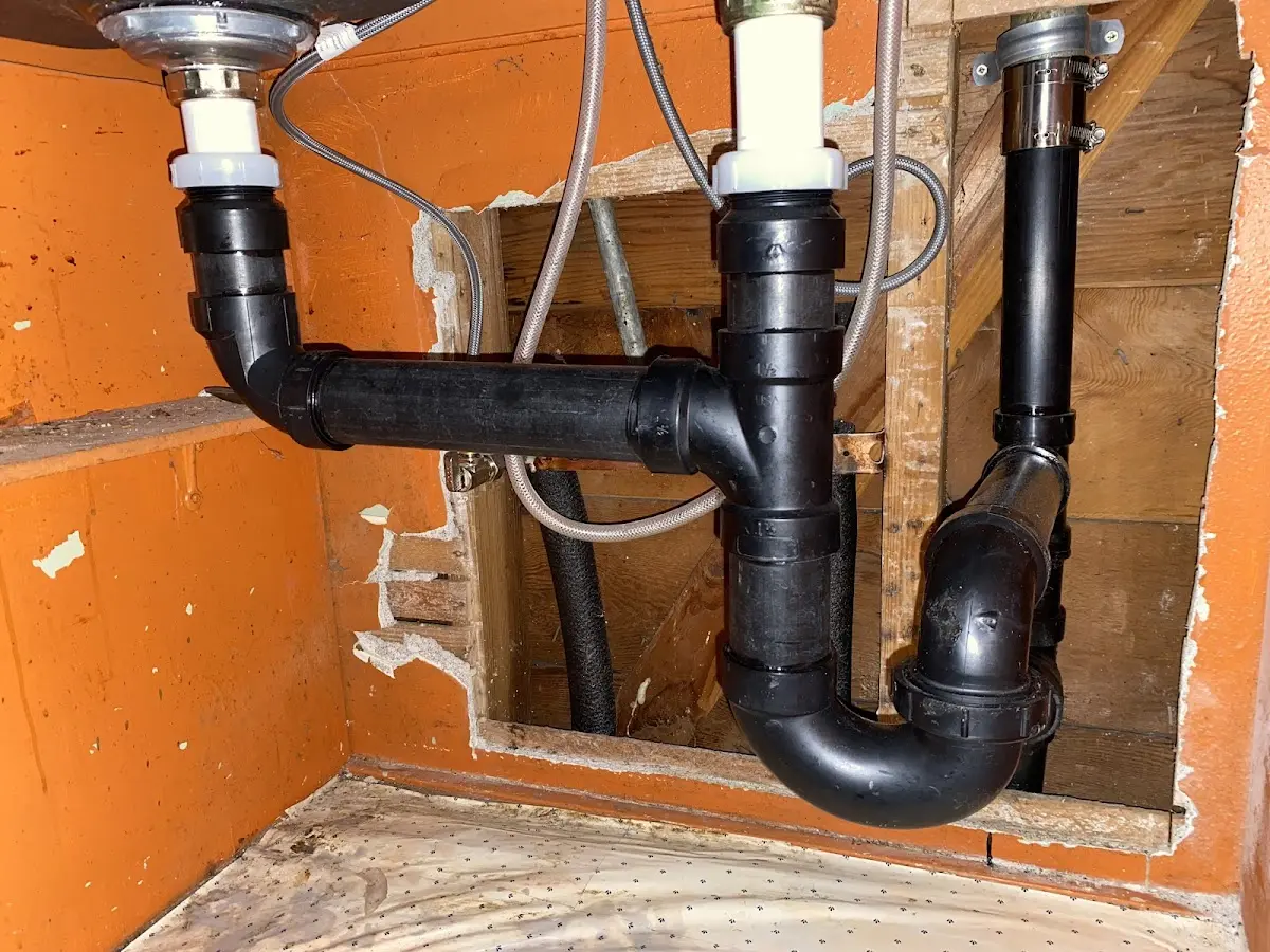 Professional Garbage Disposal Repair equipment and tools on the job in Lansford